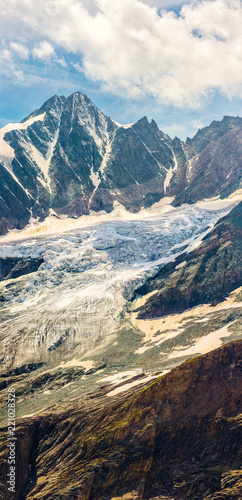 Layeres of Rocks of the Grossglocknerscharte with a variety of color tones and the so called Greenstone, the Prasinit photo