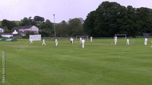 Unrecognizable people, cricket players training at a local club in England photo