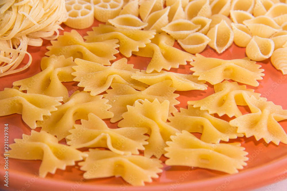 Varied macaroni on a plate macro Varied macaroni on a plate macro