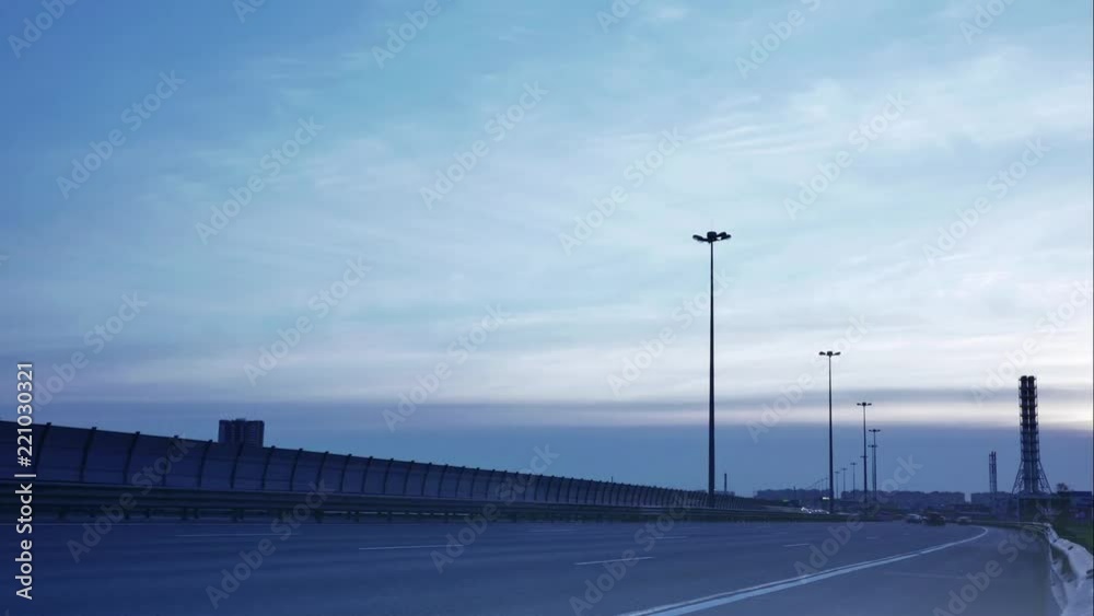 Busy traffic in the evening city in timelaps Busy traffic in the evening city in timelaps
