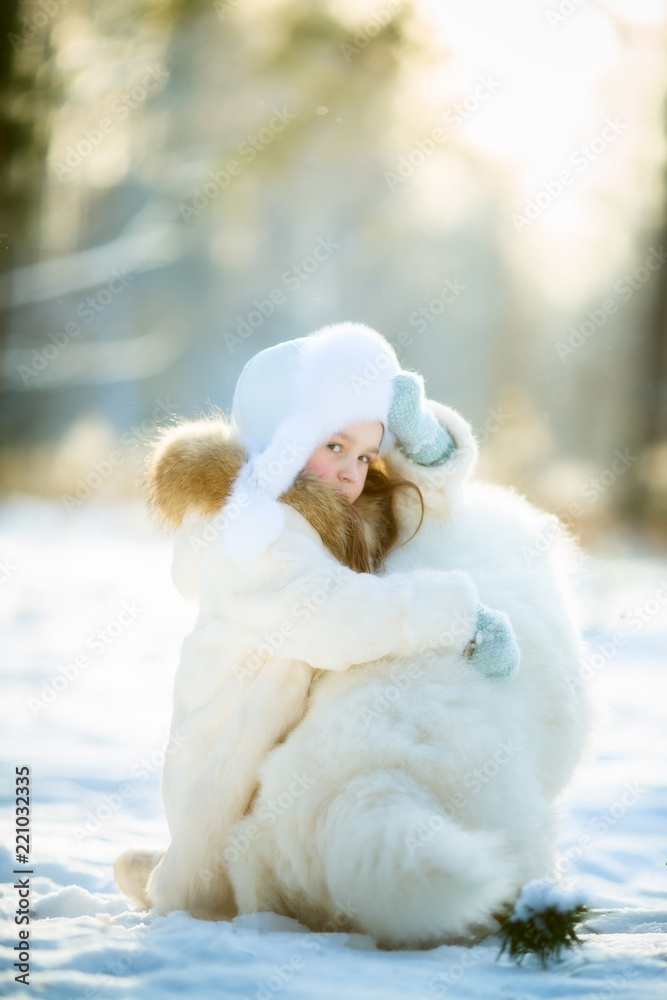 Winter girl portrait with samoyed dog Winter girl portrait with samoyed dog