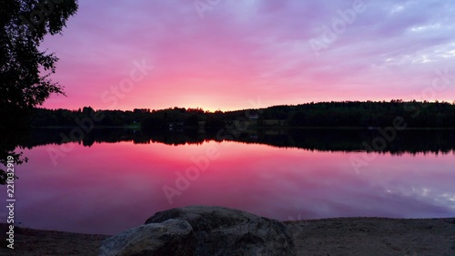 Purple sunset over mirror lake