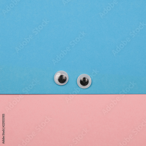 Creative Minimal Paper Smile Face With Plastic Toy Eyes Pastel Colors Flat Lay Square