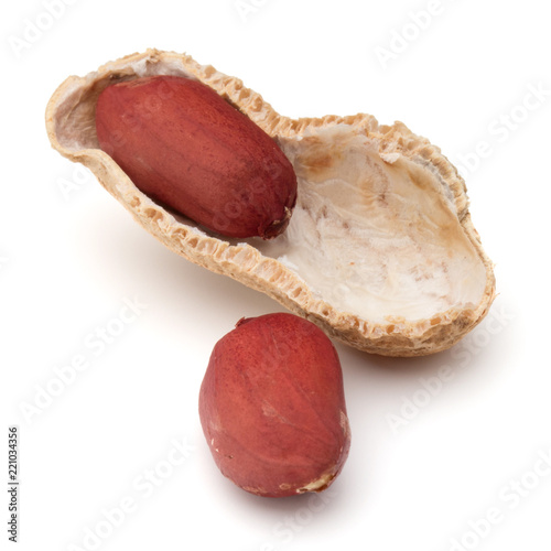 Opened peanut or groundnut pod isolated on white background close up