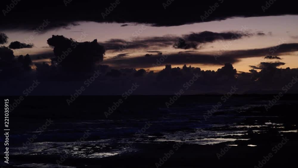 Scenic sunset over sea surface with dark stormy rainy clouds, Greece Peloponnese Scenic sunset over sea surface with dark stormy rainy clouds, Greece Peloponnese