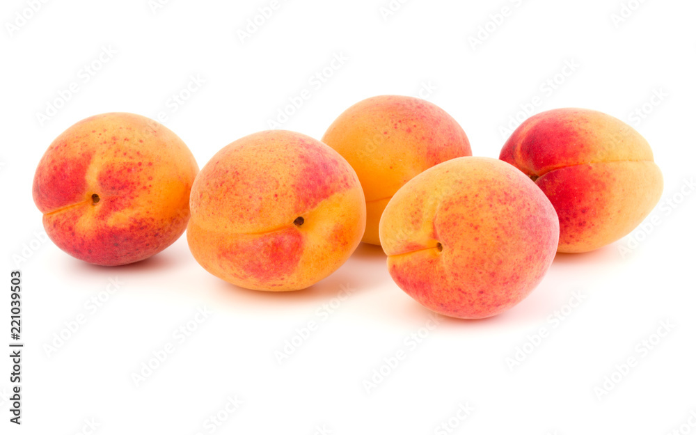 A bunch of apricot fruit isolated on white background cutout A bunch of apricot fruit isolated on white background cutout