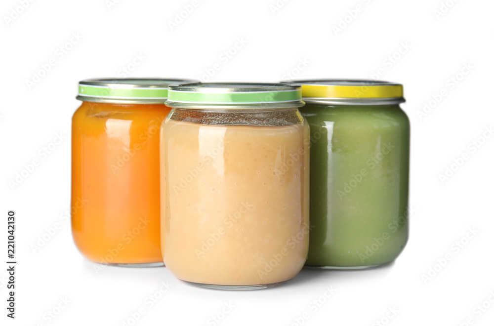 Jars with different baby food on white background Jars with different baby food on white background