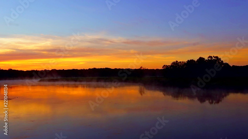 tranquil lake sunrise fog morning Landscape tranquil lake sunrise fog © ungvar