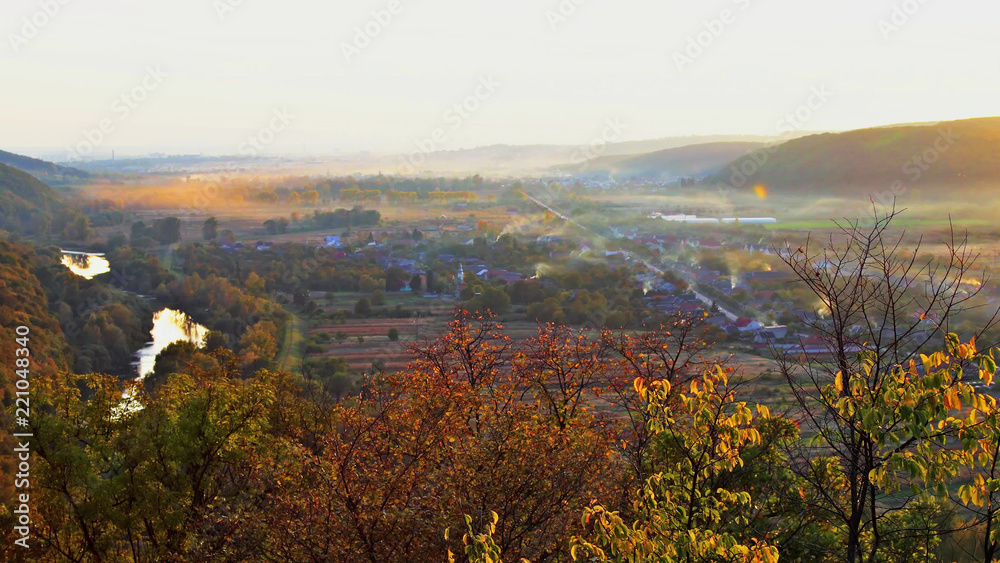 Obraz premium Landscape in autumn the mountain morning a fog on the mountain