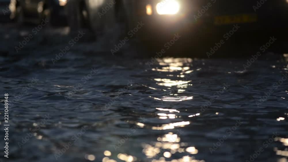 City road covered in flood water evening