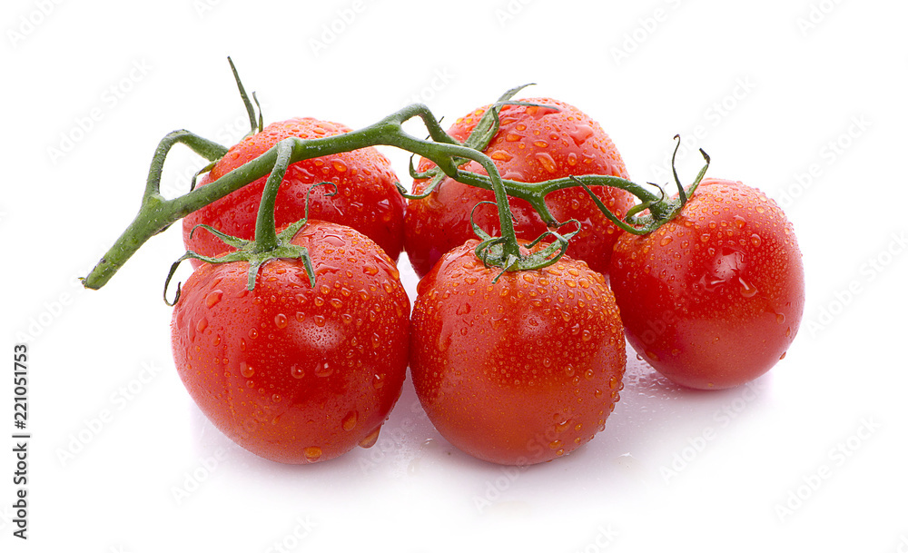 Fresh tomatoes with water drops isolated on a white background Fresh tomatoes with water drops isolated on a white background