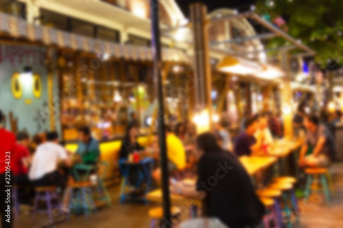 abstract blur image of night festival in a restaurant and The atmosphere is happy and relaxing with bokeh for background, Bangkok Thailand. © piyaphunjun