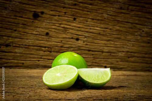 lime on choppping board wood on wood. wood background