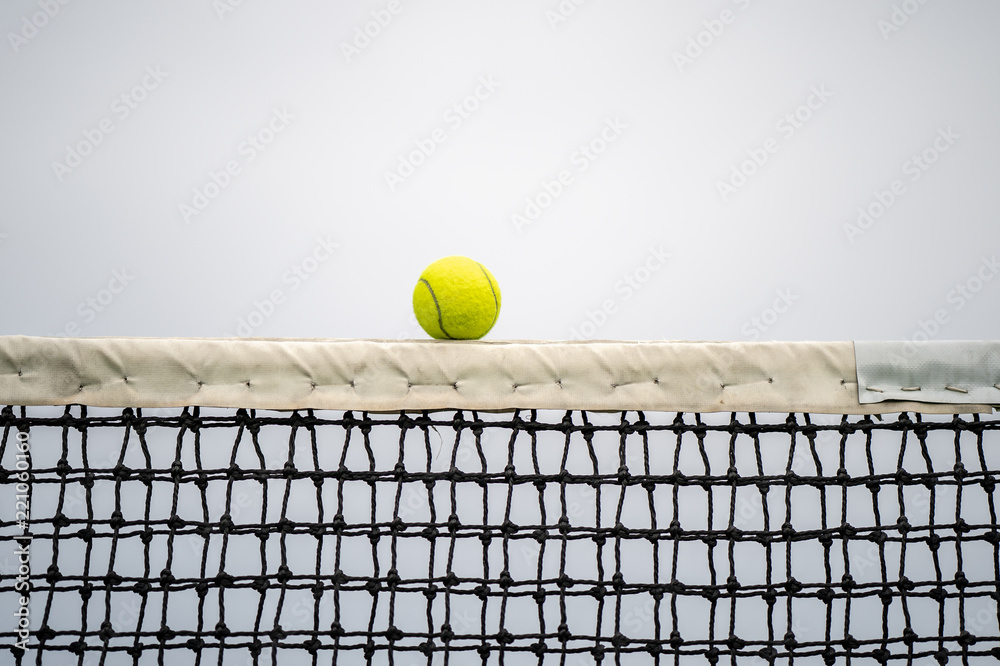 The beginning of a champion, Close up tennis ball on the courts background.