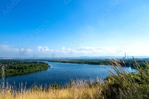 the landscape of the river and the city of Krasnoyarsk. The view from the top of the mountain