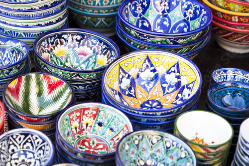 Plates and pots on a street market in the city of Bukhara, Uzbekistan.Traditional souvenir.