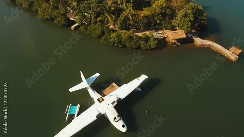 Wallpaper Mural aerial white Seaplane in the sea bay. hydroplane on the water surface near the shore Travel concept, Aerial footage. Torontodigital.ca