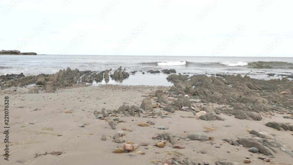 Uninhabited Wild Atlantic Ocean Coast with Rocks and Sand of Nordic Style Nature Environment at the North of Spain Uninhabited Wild Atlantic Ocean Coast with Rocks and Sand of Nordic Style Nature Environment at the North of Spain