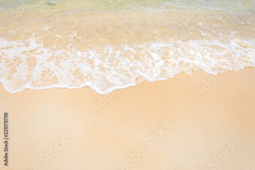sand of beach and soft wave backgroun