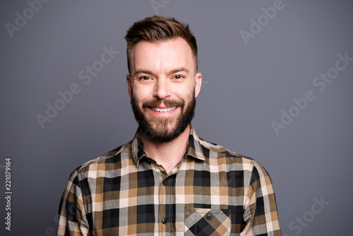 Portrait of attractive handsome man in casual street style check