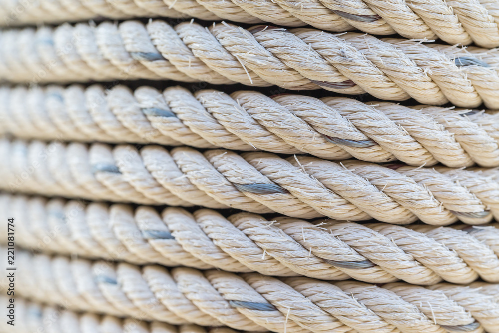Nautical ropes tied around the wood Nautical ropes tied around the wood