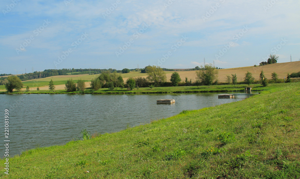 nice pond on the countryside in summer, Brusperk, Czech Republic