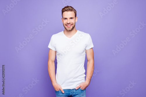 Handsome attractive bearded content guy in white tshirt and jean