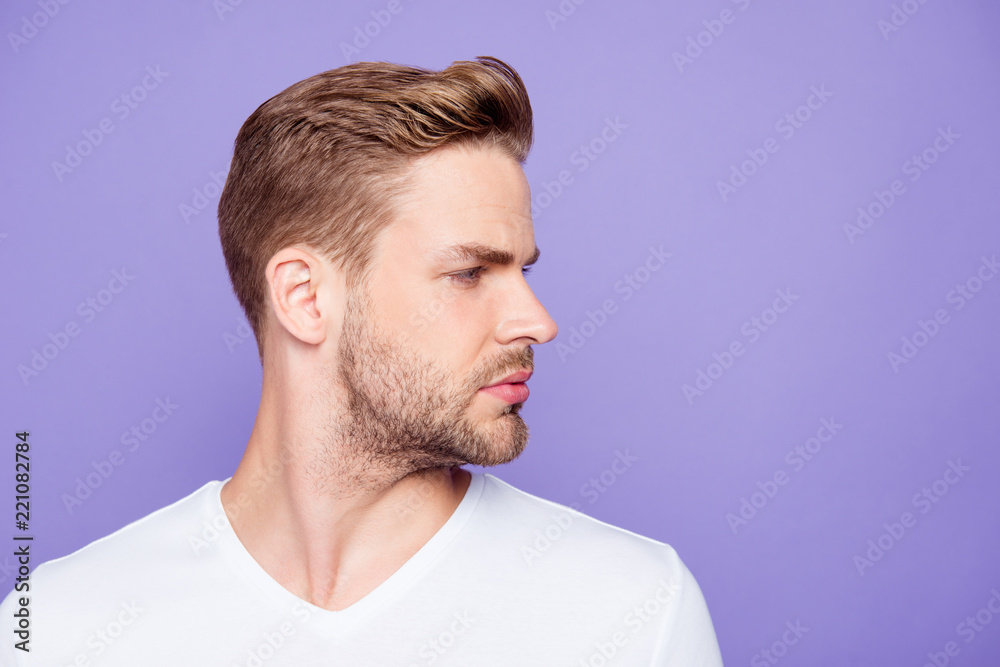 Fototapeta premium Close-up portrait of stylish minded young man with bristle looki