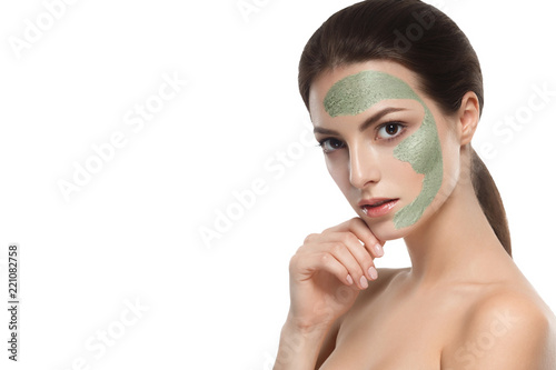 Woman with cosmetic scrab mask on face. photo