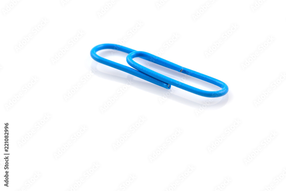 Single Blue paper clip isolated on white
