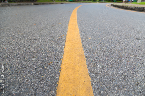 Close up of yellow line on the public park