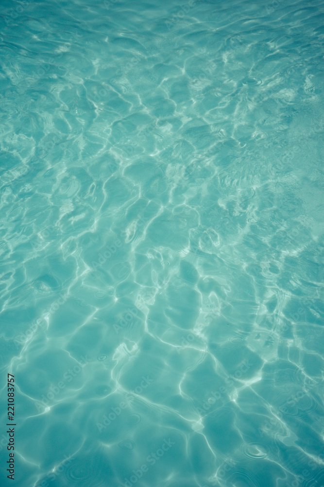 light blue water  texture pattern in swimming pool