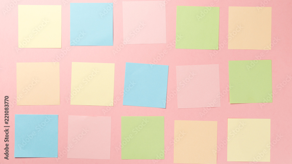 Colorful paper stickers on pink background. Top view. Flat lay. Copy space. Concept. Mock-up lot of color empty office stickers on a pink background Colorful paper stickers on pink background. Top view. Flat lay. Copy space. Concept. Mock-up lot of color empty office stickers on a pink background
