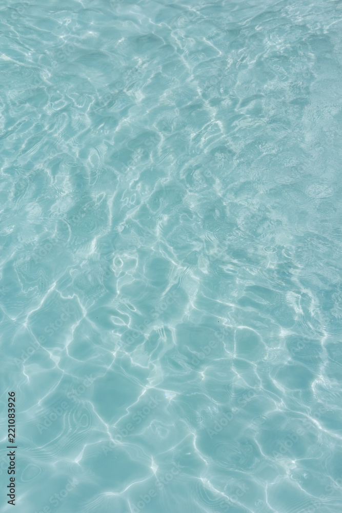 light blue water  texture pattern in swimming pool