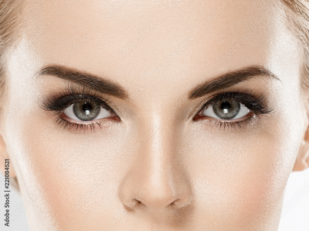 Eye lashes close up macro lashes extensions woman isolated on white Eye lashes close up macro lashes extensions woman isolated on white