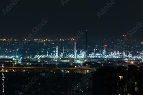 Aerial view of huge silver light industrial area line isolated on city night view background.