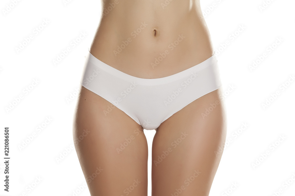 front view of female hips with white panties on white background - obrazy, fototapety, plakaty 