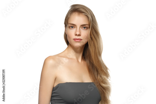 Clean skin woman with healthy blonde hair natural makeup isolated on white