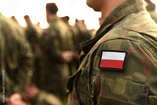 Fotografie Polish patch flag on soldiers arm