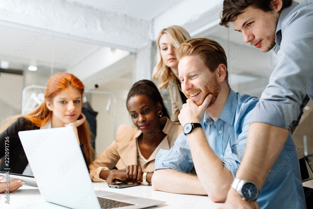 Group of business people working in office Group of business people working in office