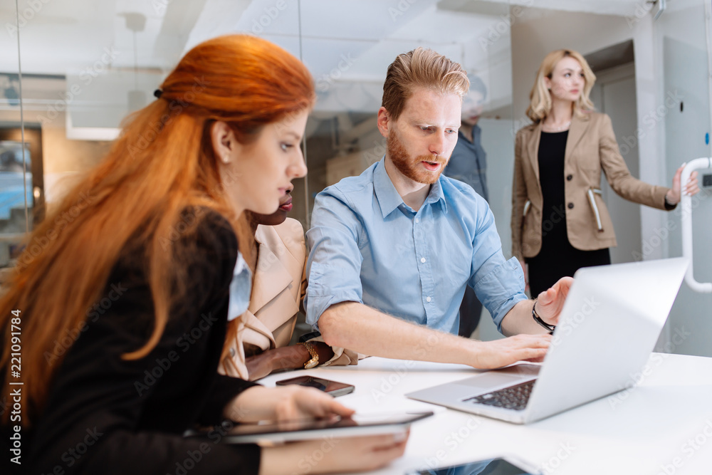 Group of business people working in office Group of business people working in office