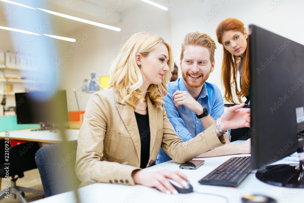 Coworkers solving problems together Coworkers solving problems together
