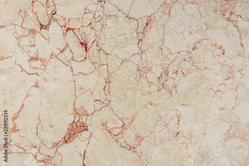 cracked texture of beige marble stone