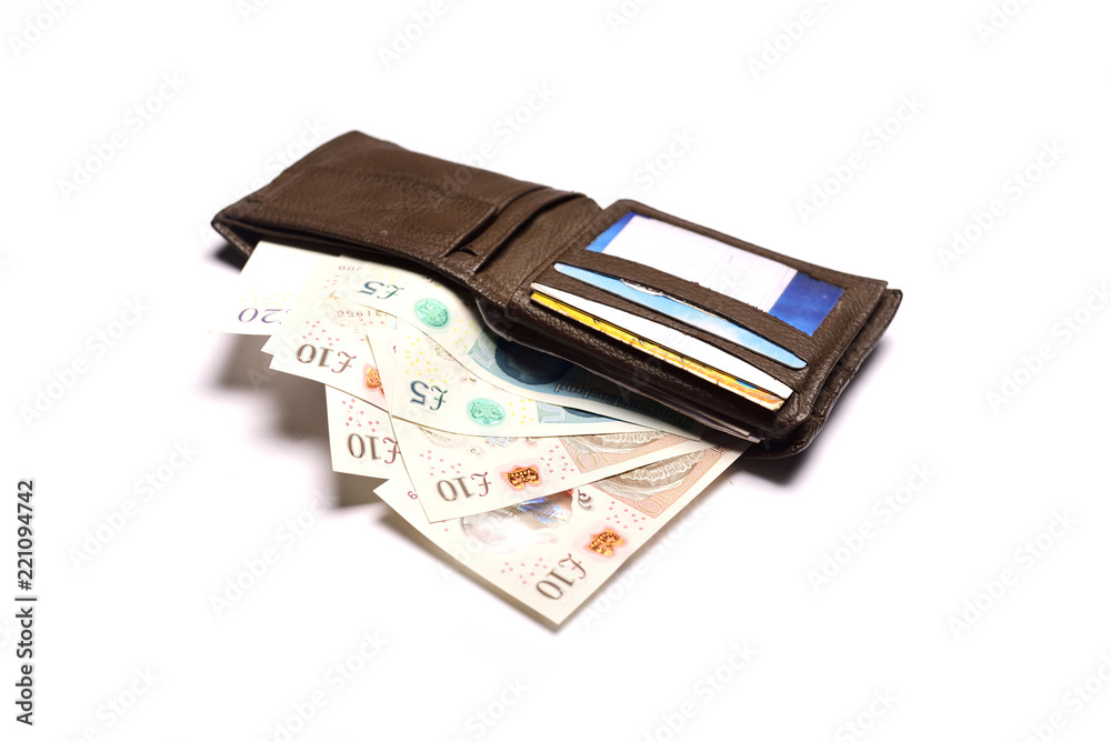 Pound sterling in wallet on isolated white background Pound sterling in wallet on isolated white background