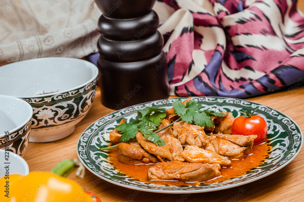 Traditional Uzbek oriental cuisine. Uzbek family table from different dishes for the New Year holiday. The background image is a top view. Traditional Uzbek oriental cuisine. Uzbek family table from different dishes for the New Year holiday. The background image is a top view.