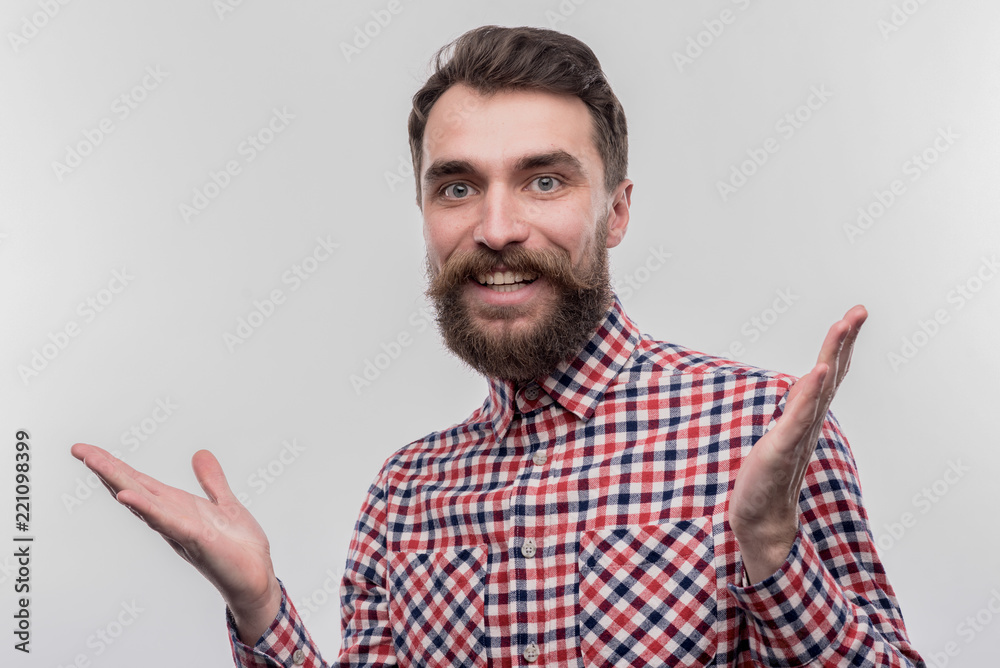 Curious businessman. Image without face retouching with blue-eyed bearded businessman feeling curious while making important decision Curious businessman. Image without face retouching with blue-eyed bearded businessman feeling curious while making important decision