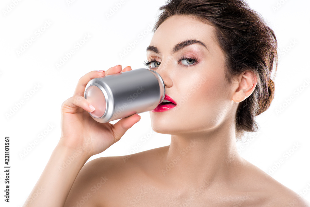 beautiful girl drinking soda from can, isolated on white beautiful girl drinking soda from can, isolated on white