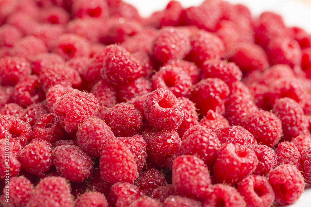Sweet raspberry on white background close up Sweet raspberry on white background close up