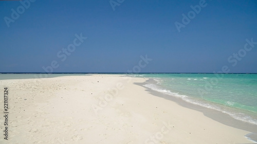 Tropical beach with white sand with beach house on a tropical island. Beautiful sky  sea. Seascape  Ocean and beautiful beach paradise. Philippines. Travel concept.
