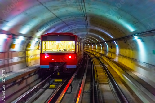Metro train in subway underground tunnel